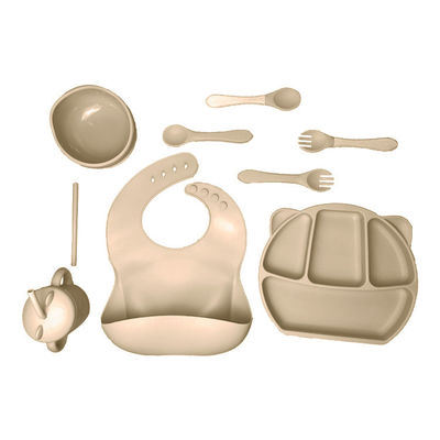 Produto comestível de alimentação do grupo do babador e da bacia do silicone do bebê com forquilhas e colheres