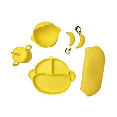 O macaco ajustado de alimentação dos desenhos animados dos utensílios de mesa do bebê prático do silicone dá forma ao produto comestível