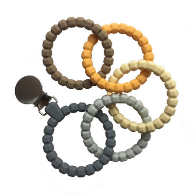 Grânulos amigáveis de Teether Ring Shape Soft Teething Chew do bebê do silicone de Eco