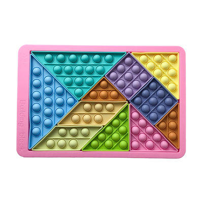 As crianças unisex que aprendem cedo brinquedos educacionais borbulham enigma do Tangram dos brinquedos da inquietação