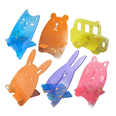 Os moldes do silicone para a resina colorida móvel do teste padrão dos desenhos animados do suporte 9pcs moldam a joia da cola Epoxy