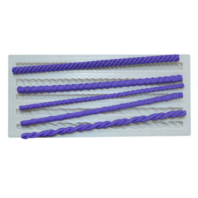 O fundente de cozimento do ofício do molde do silicone dos utensílios do bolo da forma da corda personalizou