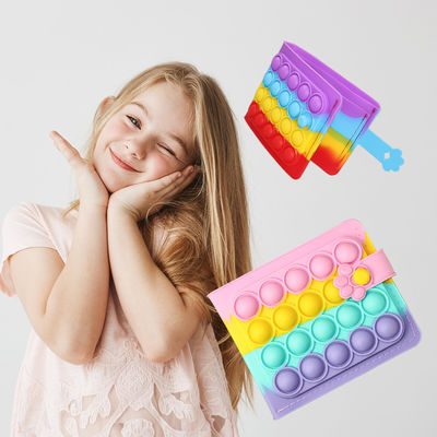 As crianças sensoriais dos brinquedos da bolsa da moeda do silicone dos produtos do silicone do bebê brincam o arco-íris de 2022 carteiras das crianças