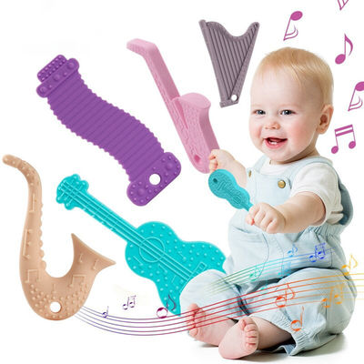 O silicone Chewable que sai os dentes a caixa de ferramentas da chupeta ajustou brinquedos macios de Soother